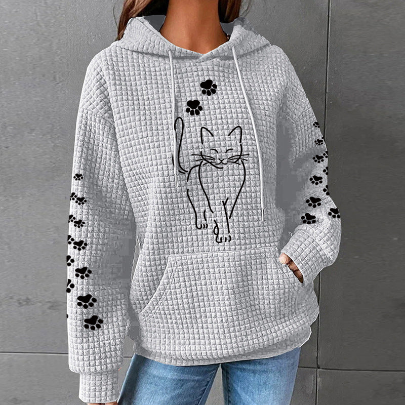 Women's loose-fitting waffle-knit pullover sweater with cat pattern